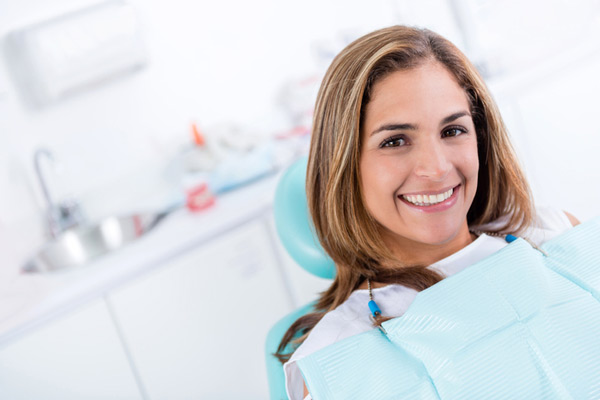 Smiling woman in a dental chair.